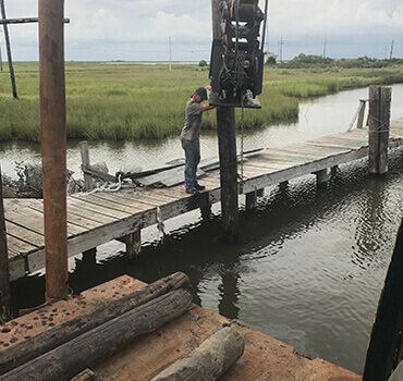 Pile Driving Construction - Gulf Coast Dock Masters